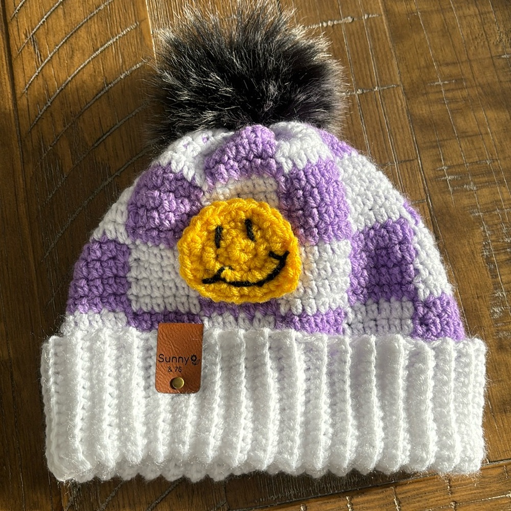 Youth teenTween and crocheted checkerboard hat withh smiley face